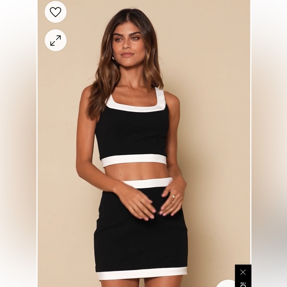 Matching top and skirt set NWOT. Never worn lll send both top and bottom size M